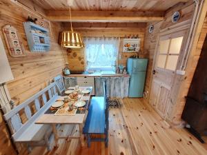 Pokój w domku z bala w Suszczy