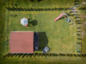 Atpūtas mājiņas Kolkā- Madaras un Rota