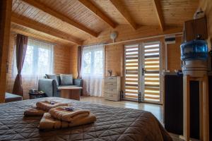 Atpūtas mājiņas Kolkā- Madaras un Rota