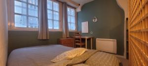 Appartements Studio plein centre : photos des chambres