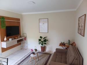 Apartamento confortável com garden