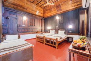 Alaya Stays Palm Dale Heritage Backwater Retreat with Garden & Restaurant