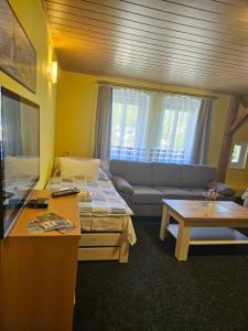 Quadruple Room with Private Bathroom room in Guest House Pod Lesem Merklín