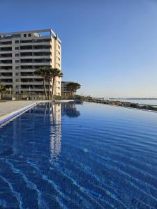 Posidonia Apartment, ground floor,3 swimming pools, jacuzzi,parking space