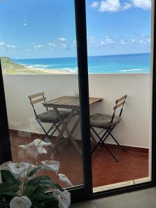 Face a locéan - Praia da areia branca, vue mer