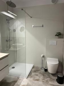 Sarbinowe Morska Bryza- Komfortowy apartament blisko plaży, idealne miejsce do odpoczynku w zaciszu!
