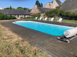 Maisons de vacances Manoir 15 mn des plages : photos des chambres