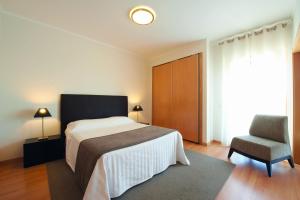 Two-Bedroom Family Apartment (4 Adults + 2 Children) room in Real Marina Residence