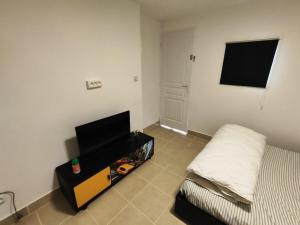 Studio plain-pied entrée privée et parking gratuit