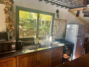 Casa loft con patio compartido