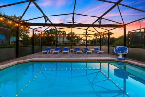 Elegant 5BR Retreat near Disney with Pool and Outdoor Lounge