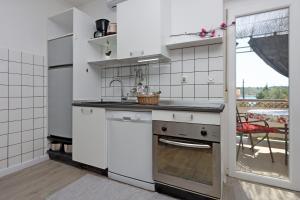 Apartments by the sea Barbat, Rab - 14247