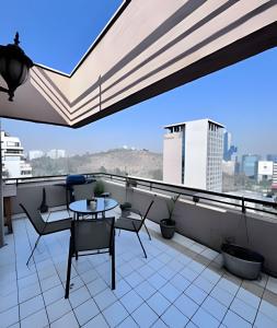 En Vitacura, con azotea, 1D 1B