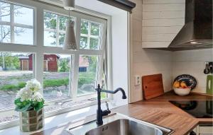 Amazing Home In Grästorp With Sauna