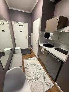 Appartements STUDIO 5 min station metro PARIS : photos des chambres