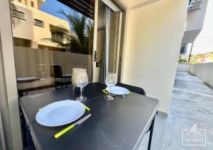 Sunset Apt moderne à 2 min de la plage, clim, piscine