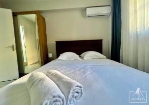 Sunset Apt moderne à 2 min de la plage, clim, piscine