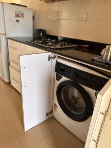 2 bedroom apartment with forest view, pool and gym in North Goa