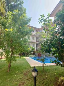 2 bedroom apartment with forest view, pool and gym in North Goa