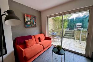 Maisons de vacances Le Jardinet - With office in the city center! : photos des chambres
