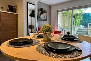 Maisons de vacances Le Jardinet - With office in the city center! : photos des chambres