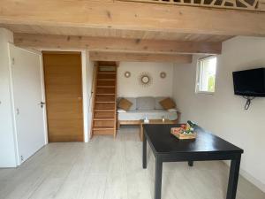 Appartements Logement avec terrasse : photos des chambres