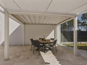 Maisons de vacances Piscine & acces a la reserve de la Belle-Henriette : photos des chambres