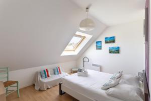 Maisons de vacances La Pointe aux Chevres - 10min a Pied de la Plage : photos des chambres