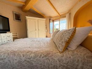 Maisons de vacances Maison : photos des chambres