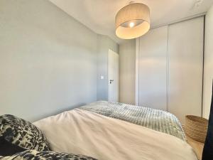 Appartements M114 Marquer Magnifique T2 avec parking aux portes de la douane de Moillesulaz : photos des chambres