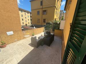 Bilocale Moderno con Terrazzo e Posto auto