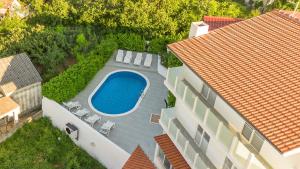 Luxury apartment Irina with private heated pool