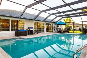 Family-Ready 4BR with Heated Pool & BBQ