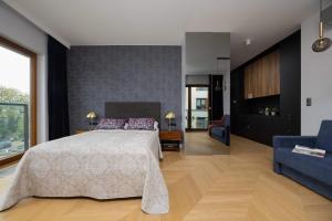 Modern Studio in Wola with Air Conditioning by Noclegi Renters