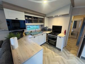 Fantasy Island - Eastgate F5- The Ardennes with Hot Tub - Coastal Caravan Breaks