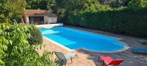 Maisons de vacances Maison avec piscine entre garrigue et Cevennes : photos des chambres