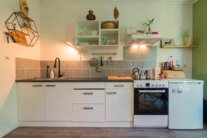 Cozy House - fietsverhuur, eigen keuken en badkamer
