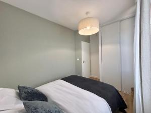 Appartements M115 Marquer charmant T2 avec Parking, aux portes de la douane de Moillesulaz : photos des chambres