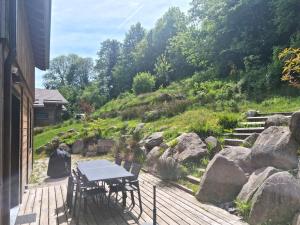 Chalets Chalet Mokki, bain nordique, balneo et sauna : photos des chambres