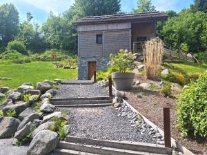 Chalets Chalet Mokki, bain nordique, balneo et sauna : photos des chambres