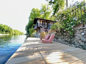 Maisons de vacances Le chalet bucolique au bord de l'eau : photos des chambres