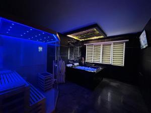 Appartements Le Prestige Spa jacuzzi et sauna traditionnel : photos des chambres