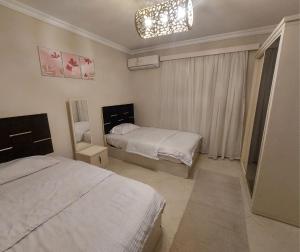 شقة فندقية بكمبوند دار مصر الشيخ زايد