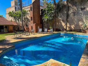 House with large garden and pool