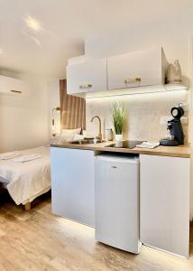 Appartements Studio 2 - Cinema Sport Parking - DABNB : photos des chambres