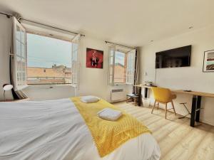 Appartements Capitole by Yumē : photos des chambres