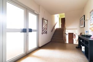 Appartements Les Mimosas - App 01 - Appartement Cosy RDC : photos des chambres