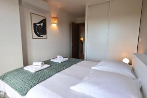 Appartements T3 Cabine, vue mer, piscine chauffee, plage : photos des chambres