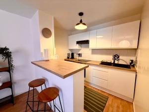 Appartements T2 lumineux cosy avec terrasse - parking privee & metro Borderouge 5 min - proche centre ville : photos des chambres