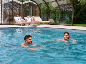 Appartements Residence hoteliere et SPA des sources du gros noyer : photos des chambres